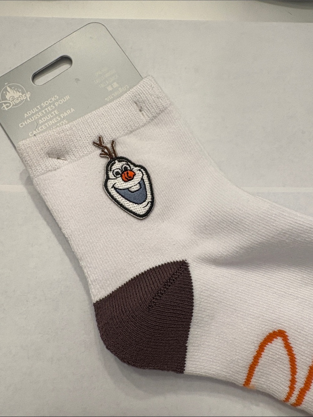 Disney White Crew Socks with Olaf Patch and Brown Heel
